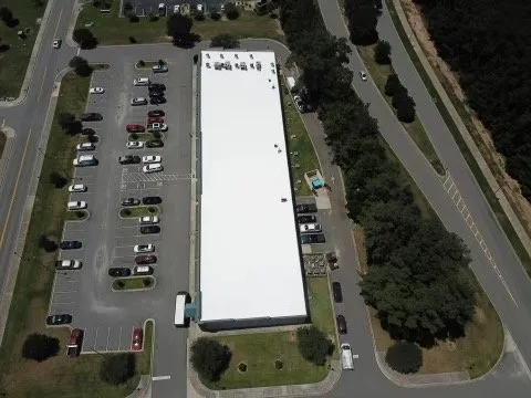 Slide of LandShark Roofing