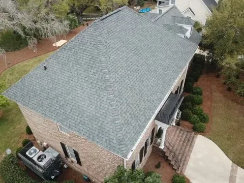 Slide of LandShark Roofing