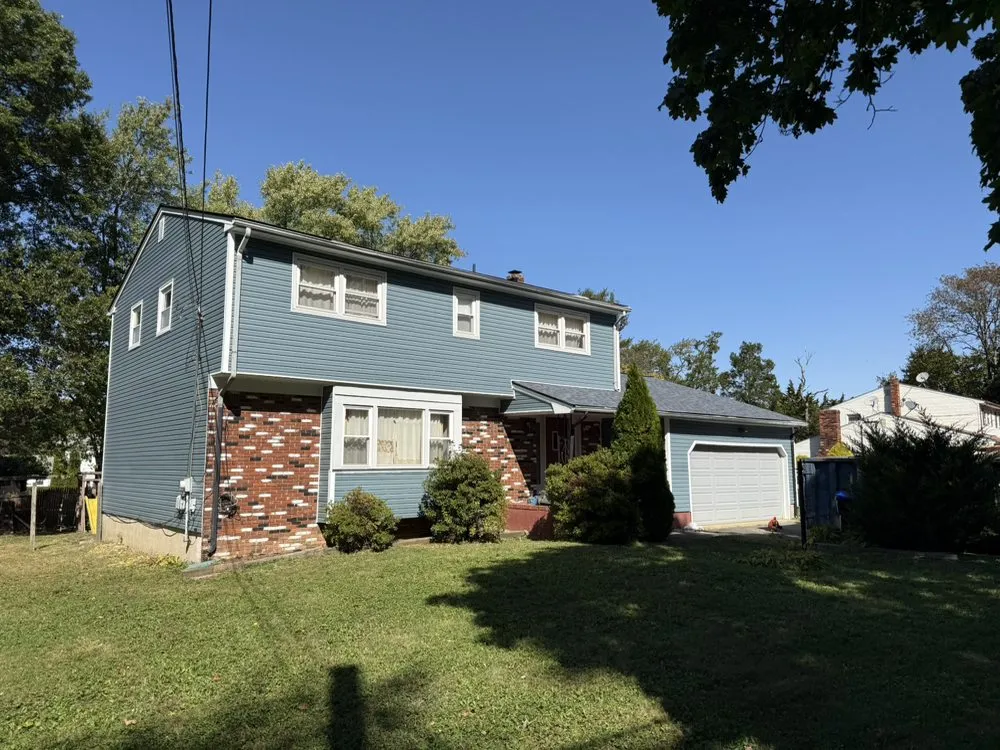 Trusted storm damage roof repair near you in Parlin, NJ by Lang & Son's Construction