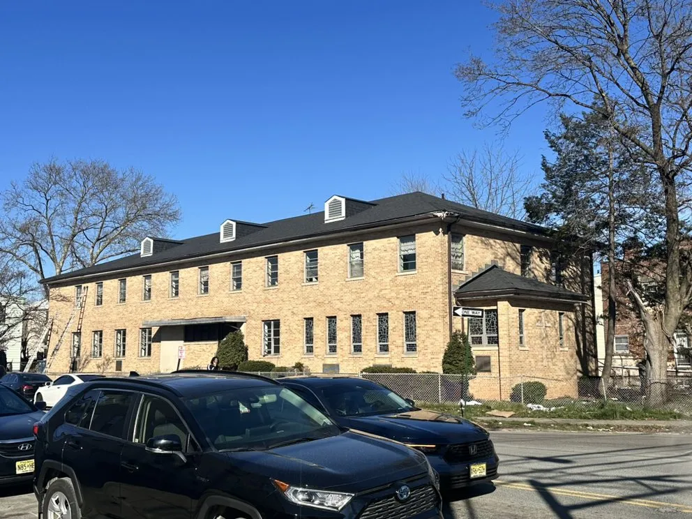 Professional storm damage roof repair in Parlin, NJ by Lang & Son's Construction
