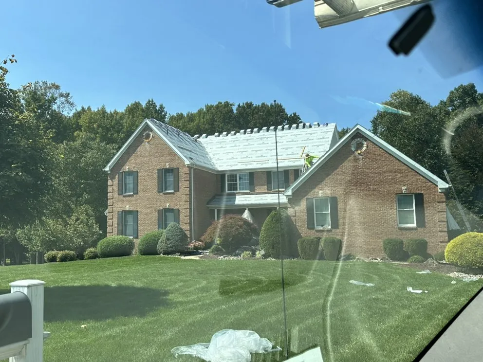 Reliable storm damage roof repair in Parlin, NJ by Lang & Son's Construction