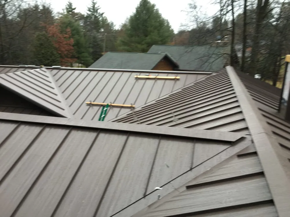 Slide of Lang and Son Roofing