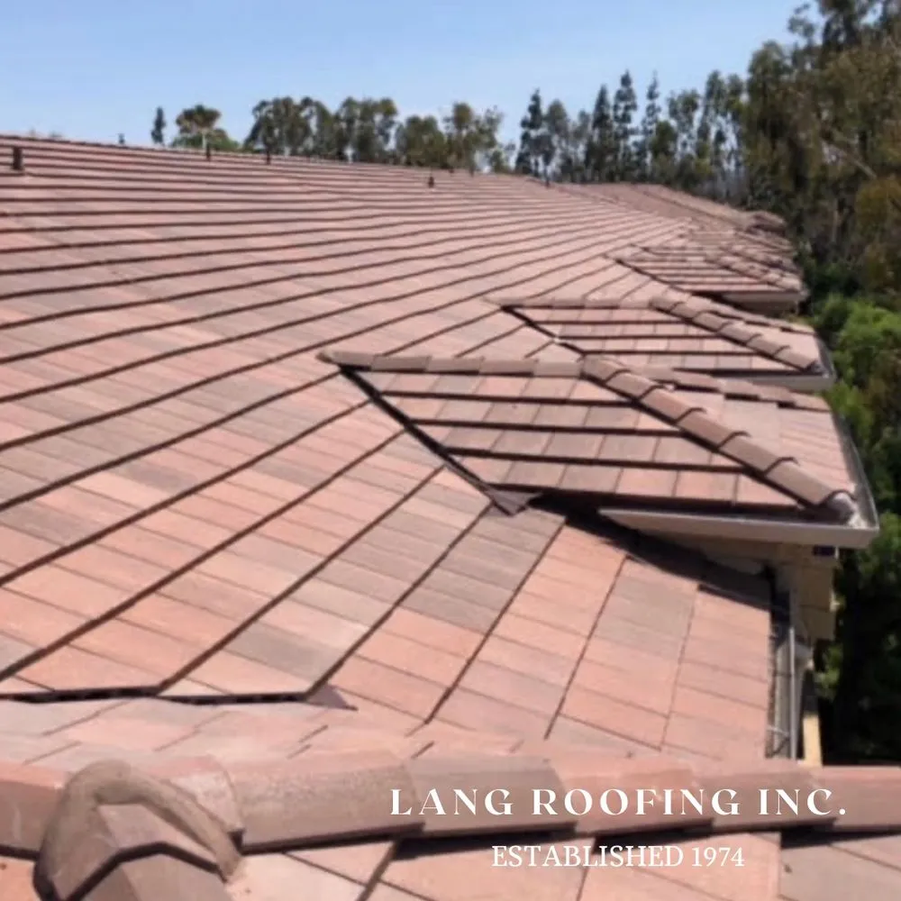 Slide of Lang Roofing