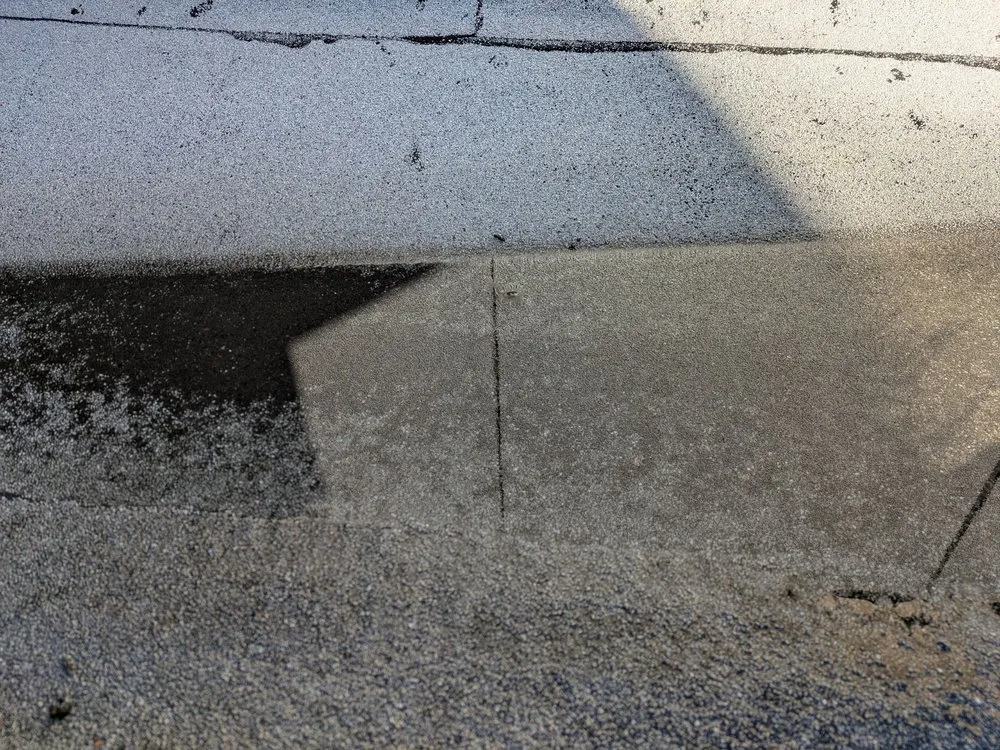 Slide of Lang Roofing