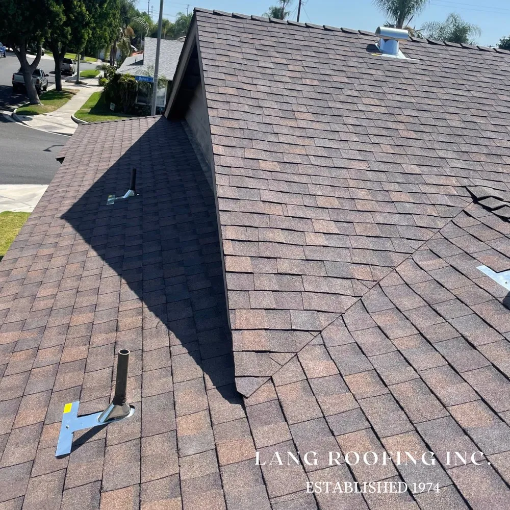 Slide of Lang Roofing