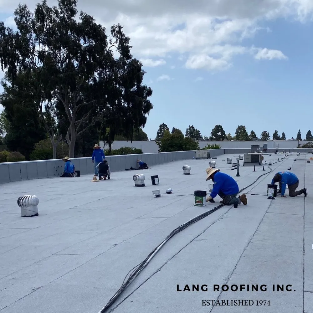 Slide of Lang Roofing