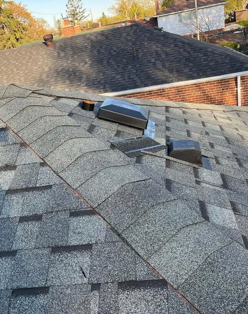 Slide of Lanier Heights Roofing