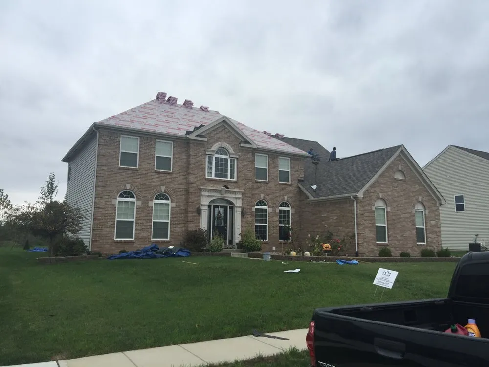 Slide of Lansky Roofing