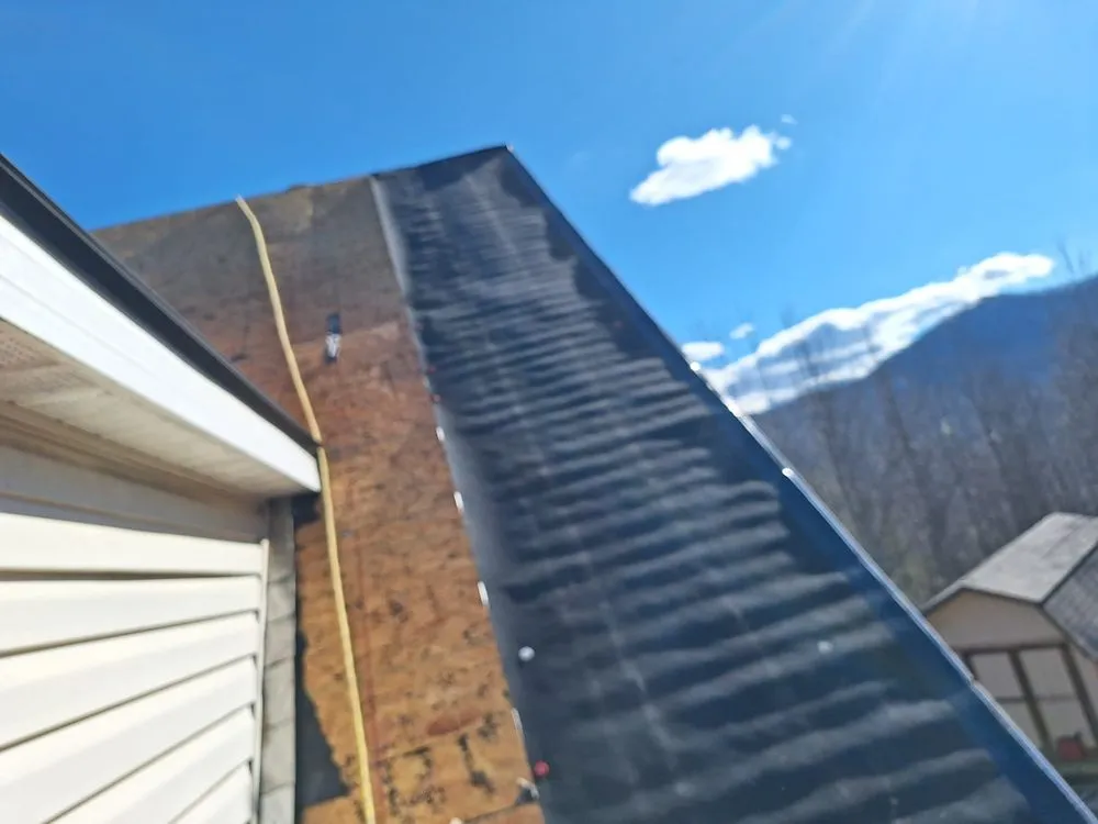 Slide of Larios Roofing