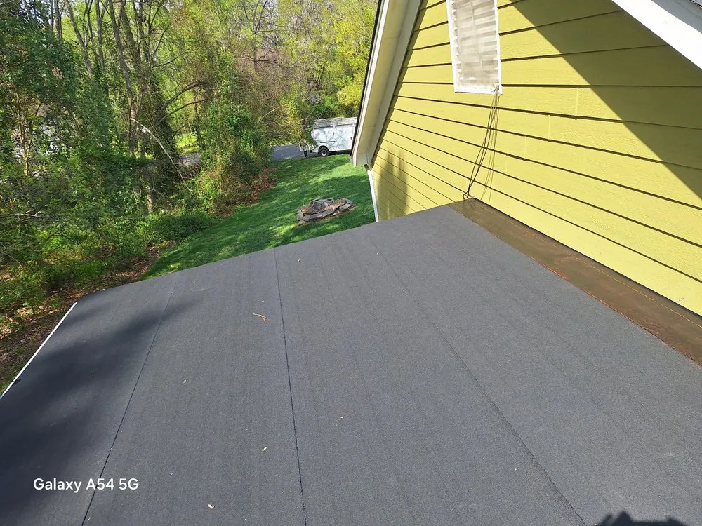 Slide of Larios Roofing