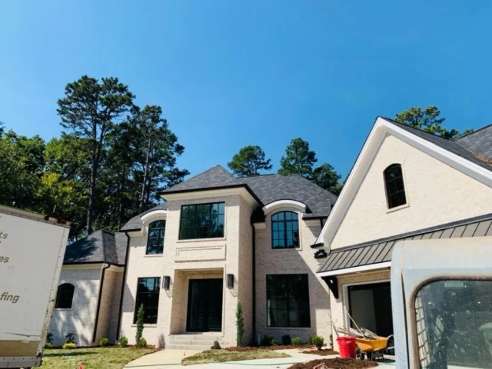 Local roof leak repair after storm damage in Fuquay-Varina, NC by Last Stop