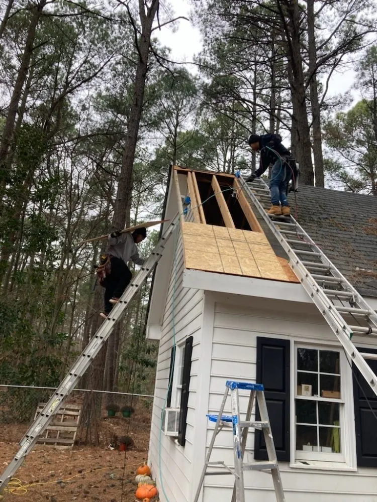 Local storm damage roof repair with free inspection in Fuquay-Varina, NC by Last Stop
