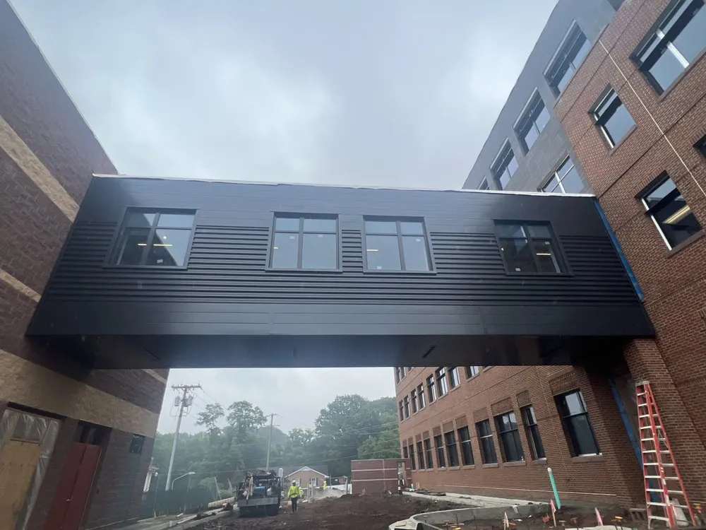 Slide of Latino Roofing