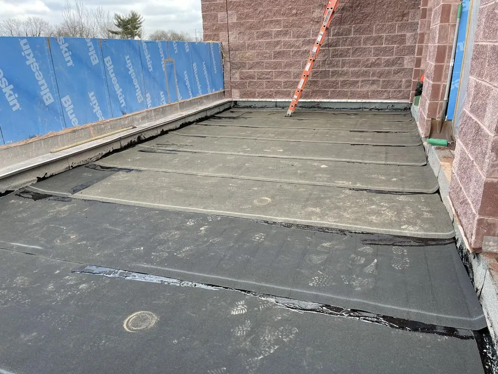 Slide of Latino Roofing