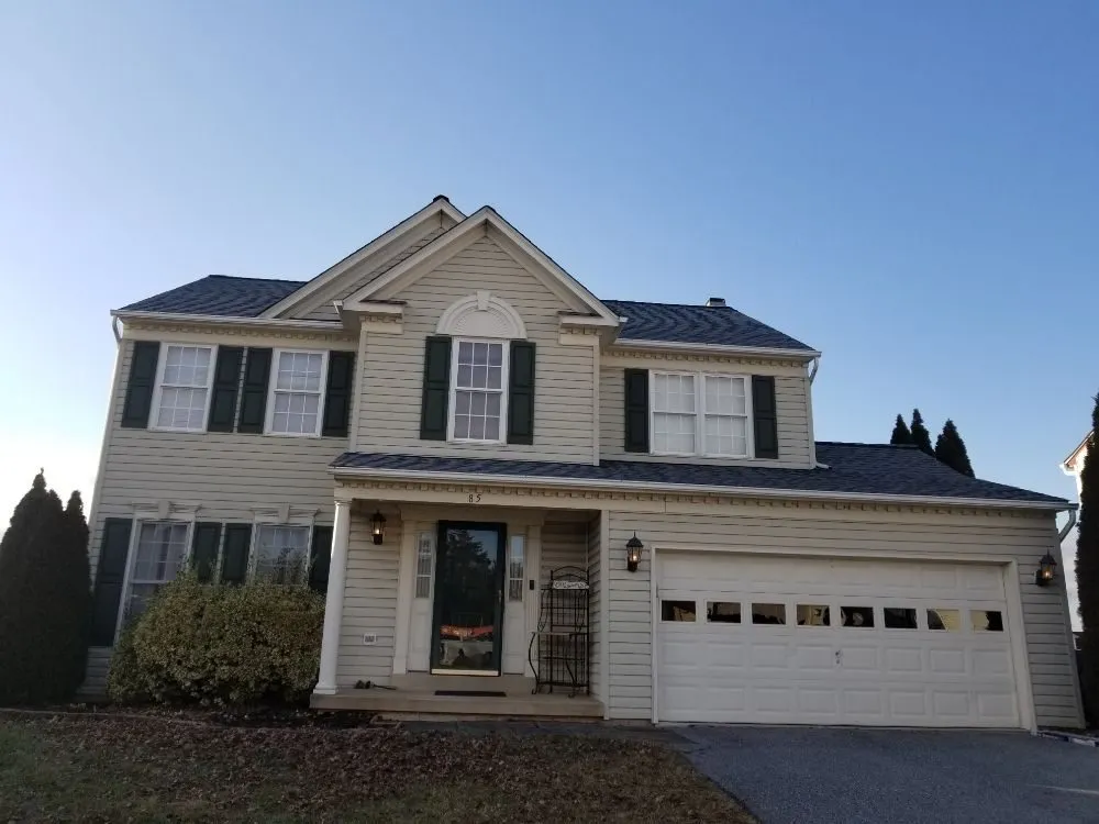 Slide of Laurel Roofing and Construction