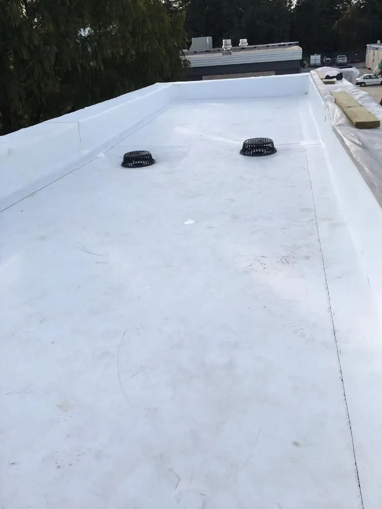 Slide of Laurel Roofing and Construction