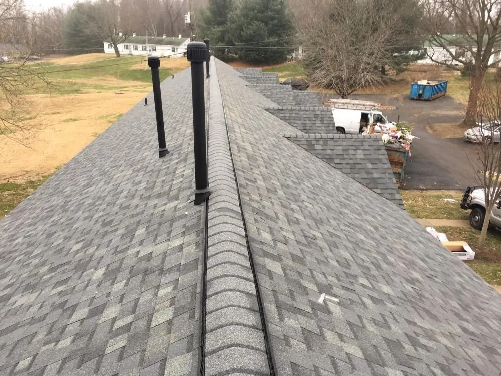 Slide of Laurel Roofing and Construction