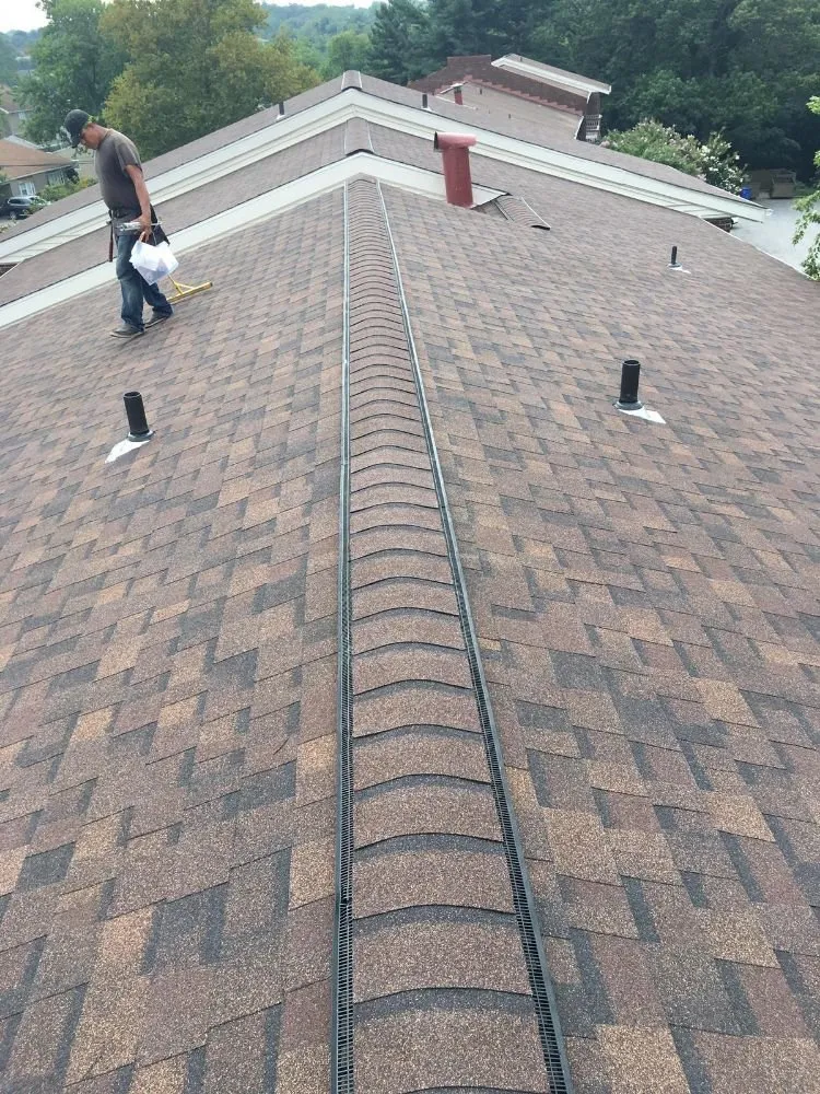 Slide of Laurel Roofing and Construction