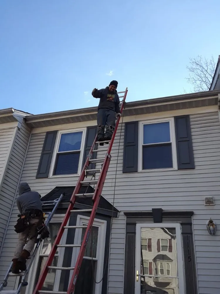 Slide of Laurel Roofing and Construction