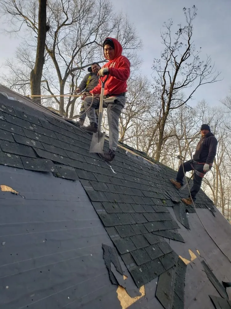 Slide of Laurel Roofing and Construction