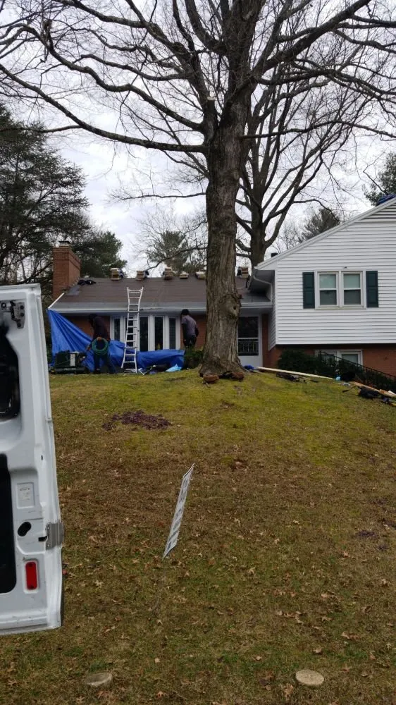 Slide of Laurel Roofing and Construction