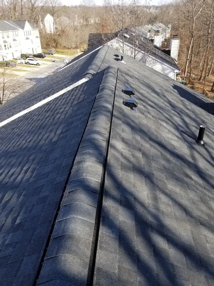 Slide of Laurel Roofing and Construction
