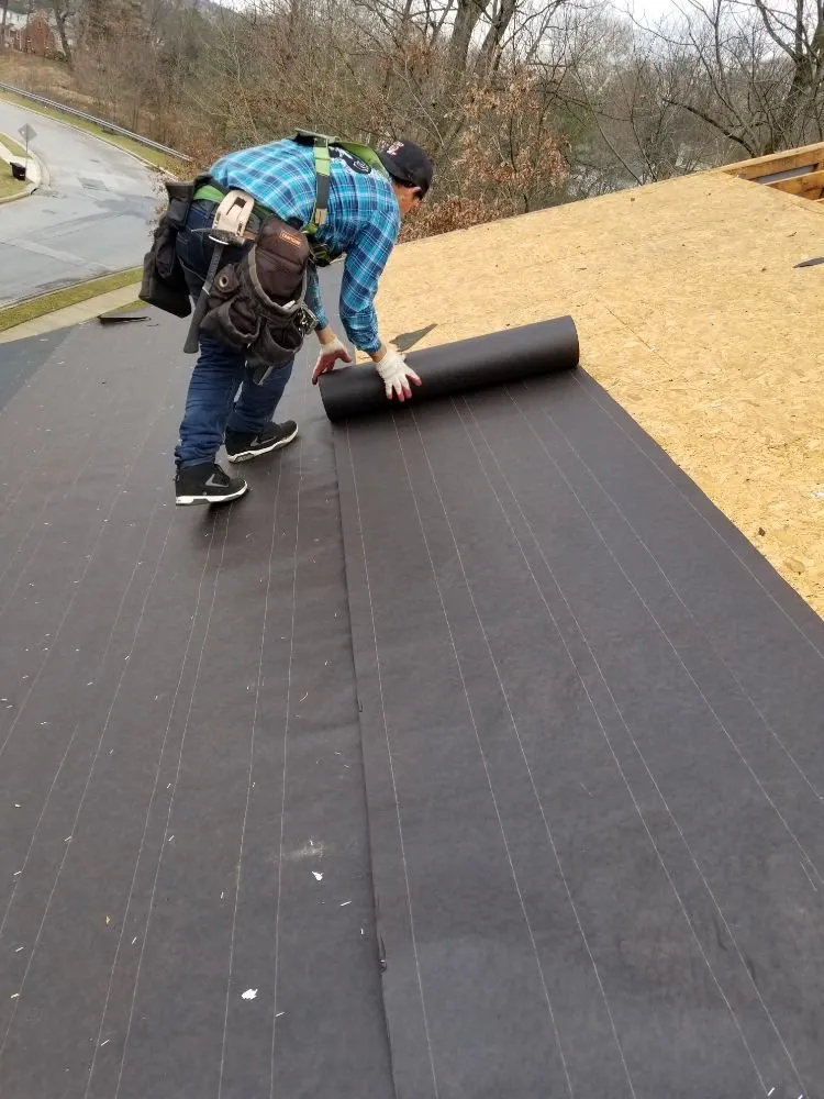 Slide of Laurel Roofing and Construction