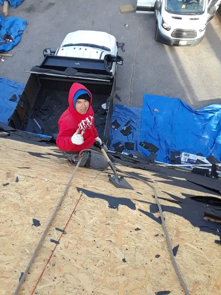 Slide of Laurel Roofing and Construction