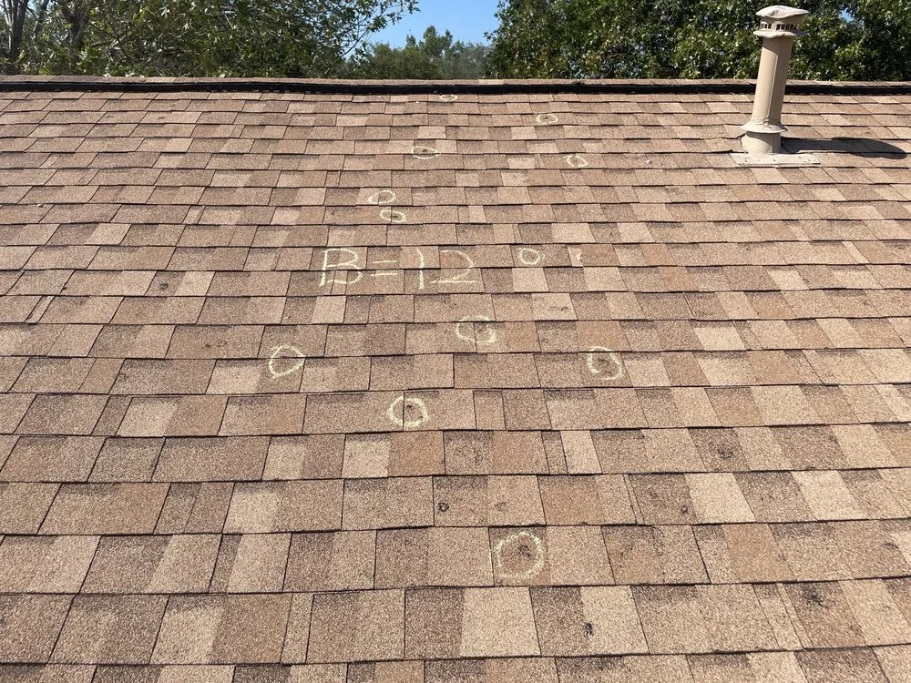 Slide of Laursen Roofing