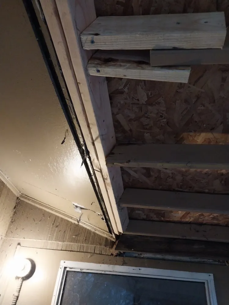 Slide of Lawson's Roofing