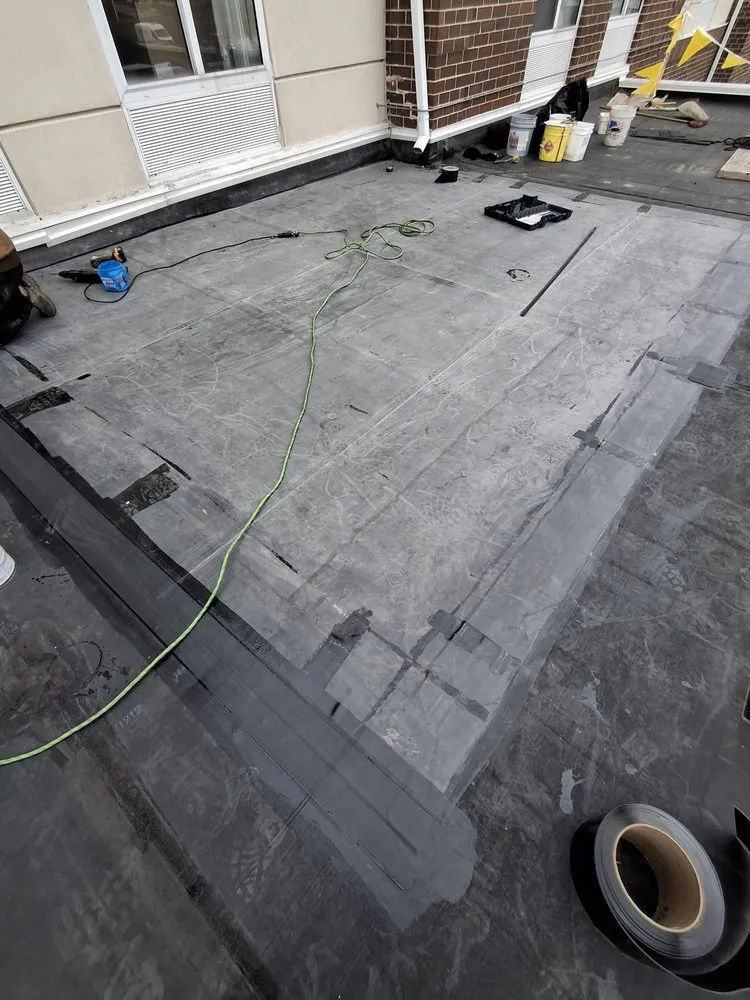 Slide of Lay Roofing