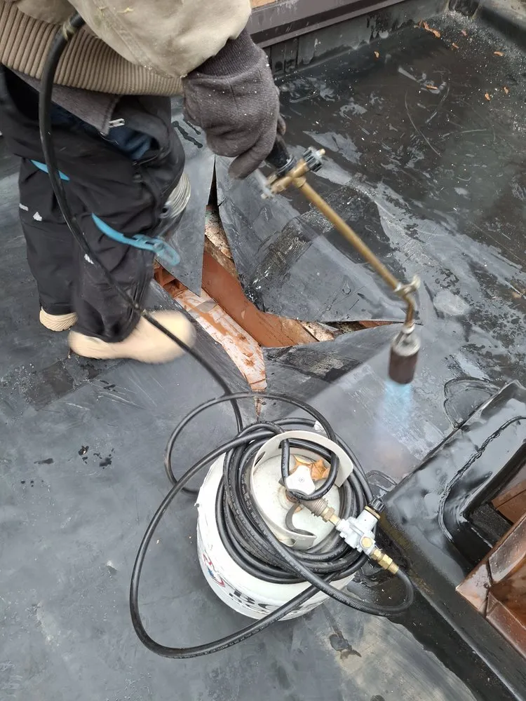 Slide of Lay Roofing