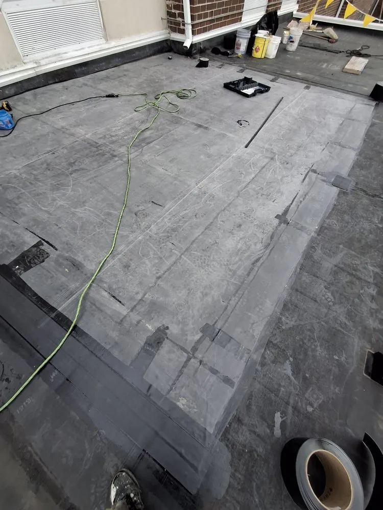 Slide of Lay Roofing