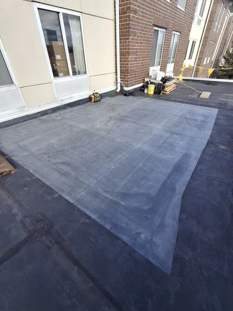 Slide of Lay Roofing