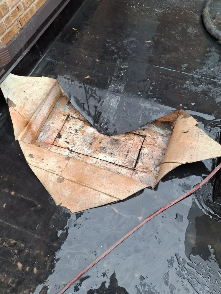 Slide of Lay Roofing