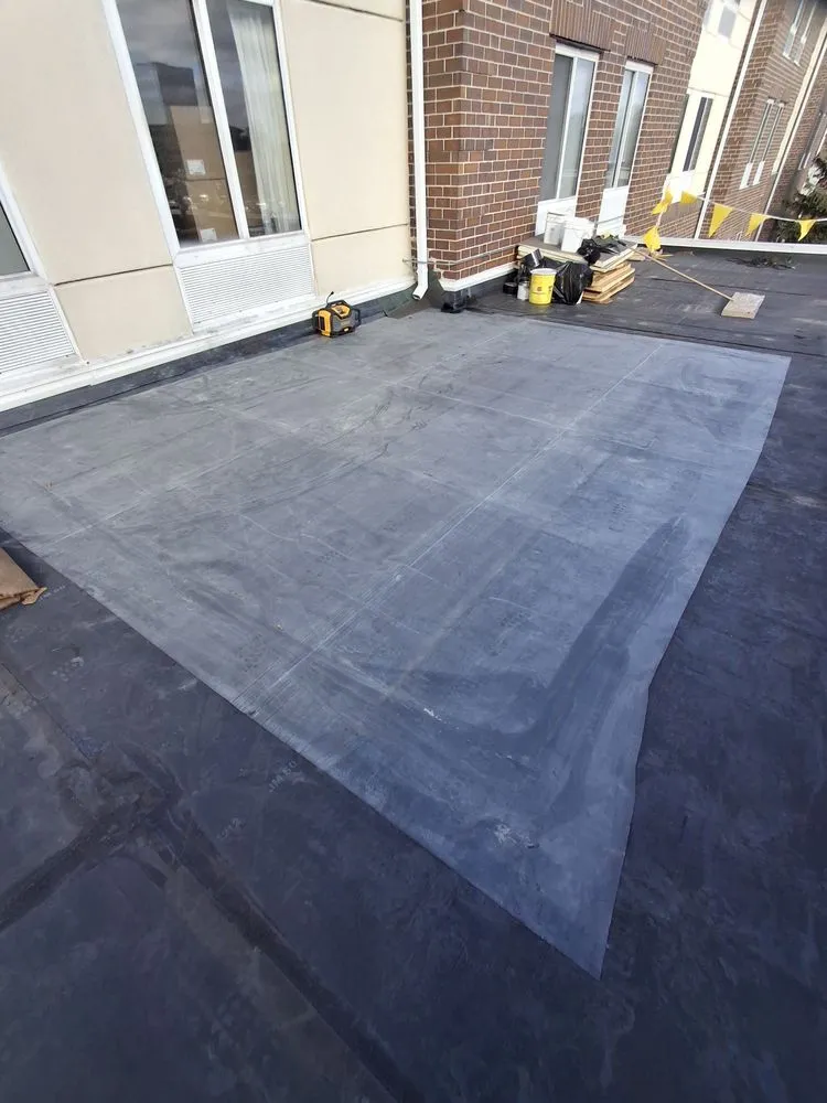 Slide of Lay Roofing