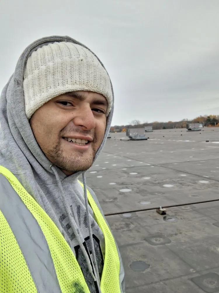 Slide of Lay Roofing