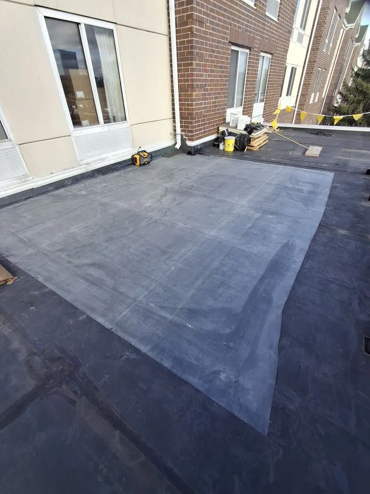 Slide of Lay Roofing