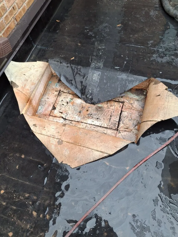 Slide of Lay Roofing