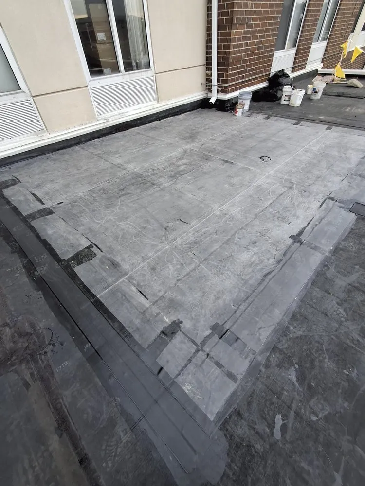 Slide of Lay Roofing