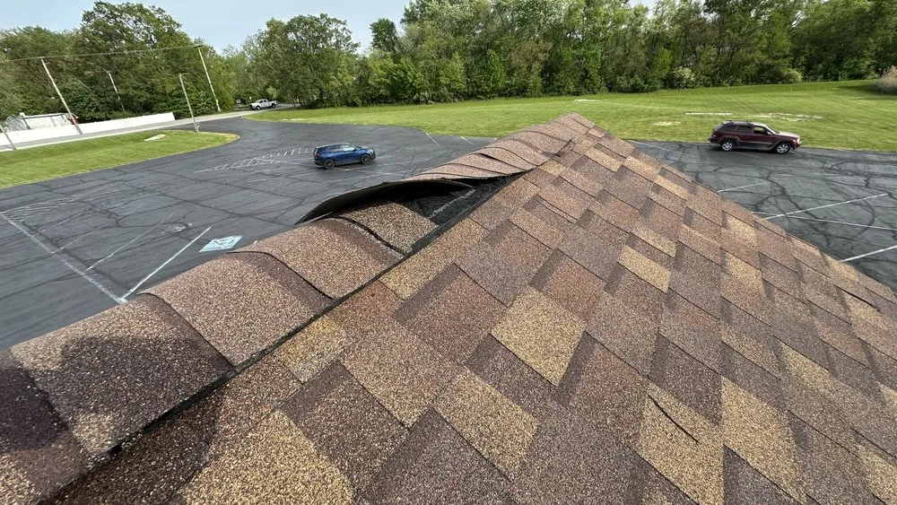 Slide of Layman Roofing & Siding