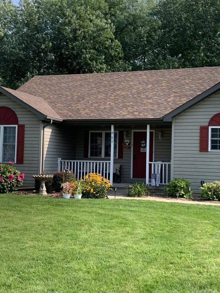 Slide of Layman Roofing & Siding