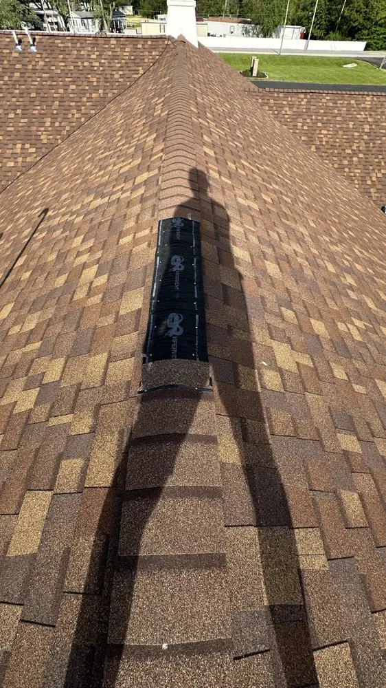 Slide of Layman Roofing & Siding