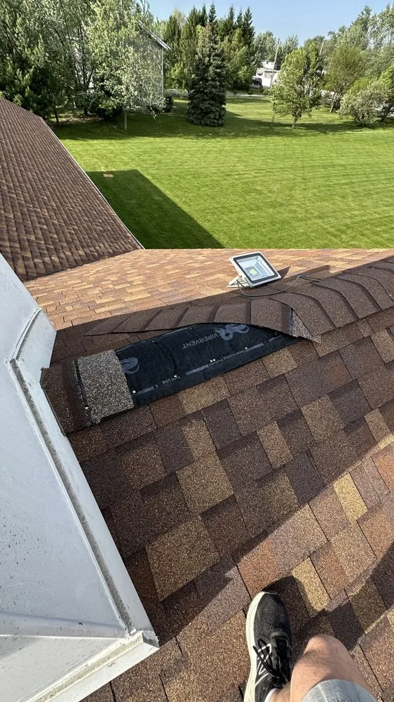 Slide of Layman Roofing & Siding