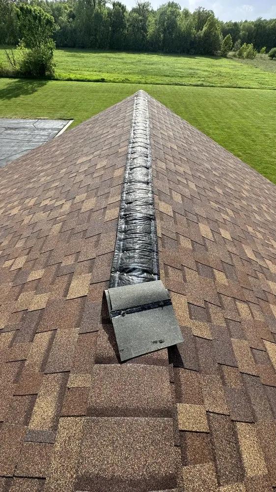 Slide of Layman Roofing & Siding