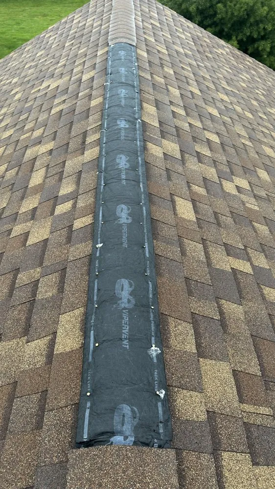 Slide of Layman Roofing & Siding