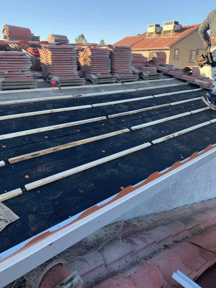 Slide of LB Banuelos Roofing