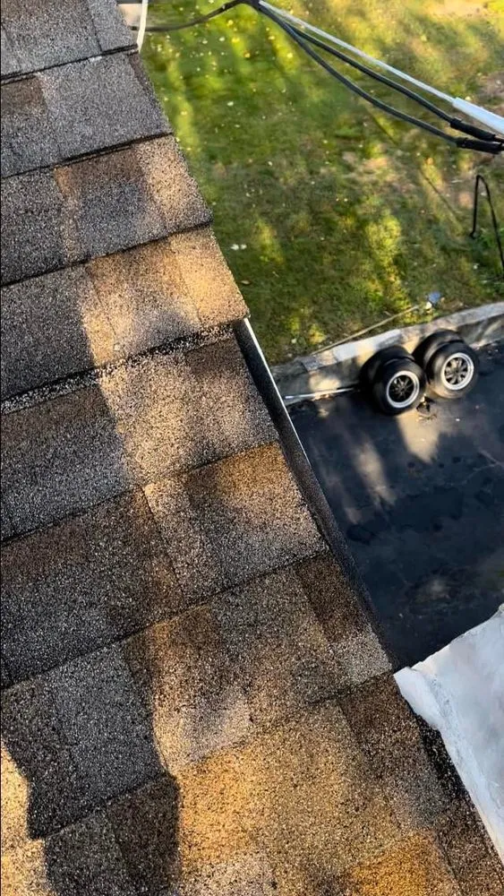 Slide of LE All Season Roofing & Siding