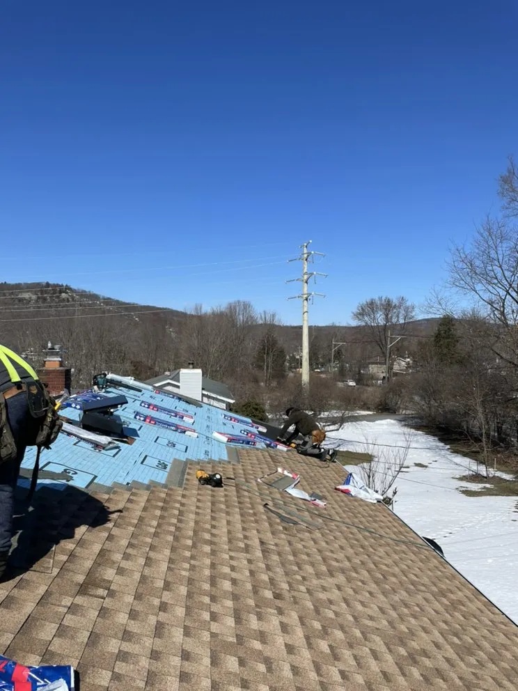 Slide of LE All Season Roofing & Siding