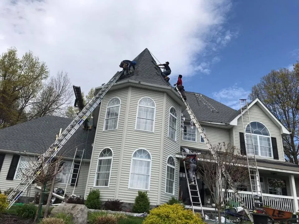 Slide of LE All Season Roofing & Siding